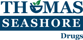 image of Thomas Seashore Drugs logo blue with a green leaf in the logo