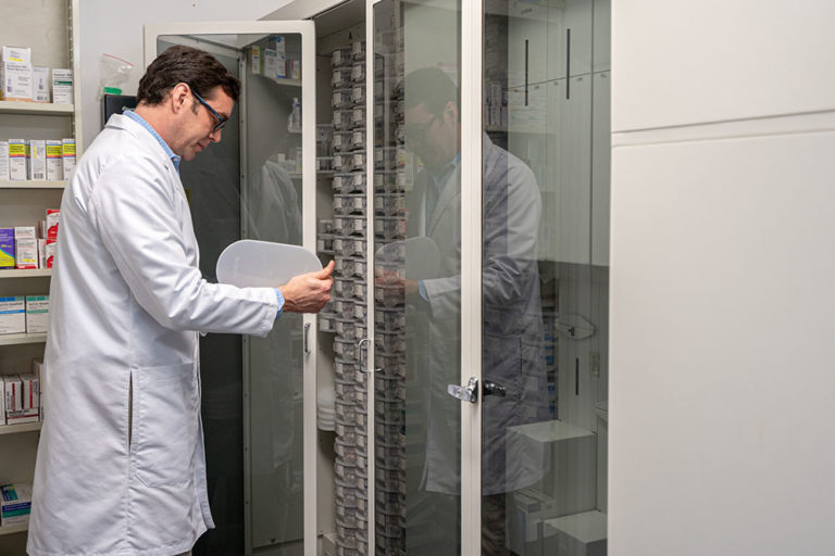 compounding pharmacy calabash, nc, image of Ed Thomas, PharmD, RPh working in the pharmacy