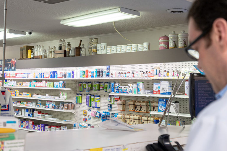 cbd calabash, nc, image of Ed Thomas, PharmD, RPh working behind the counter