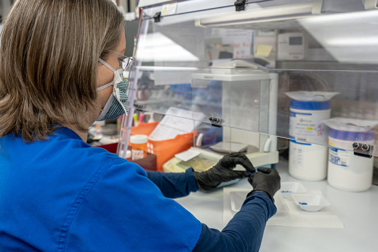 Compounding Drugs, Image of one of our pharmacists finalizing a drug compound order for our patients.