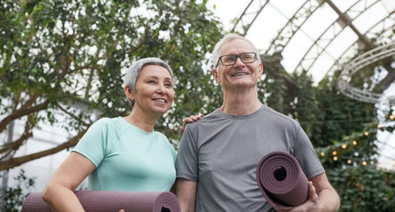 Sildenafil, image of a couple holding yoga mats.